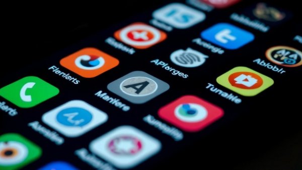 AI-related app icons on smartphone screen, close-up view.