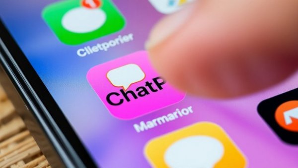 Finger interacting with ChatGPT app icon on smartphone, em dash change in ChatGPT.