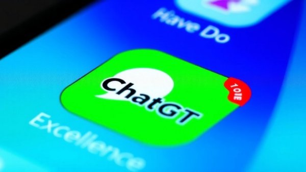 Close-up of ChatGT app icon on smartphone screen, glowing stars.