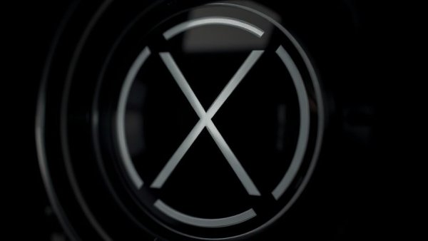 Sleek futuristic X logo, symbolic of Twitter brand lawsuit.
