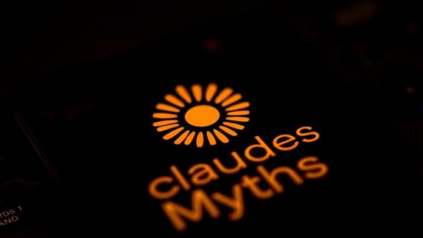 Close-up of smartphone screen with sunburst logo and 'Claude Mythos'.