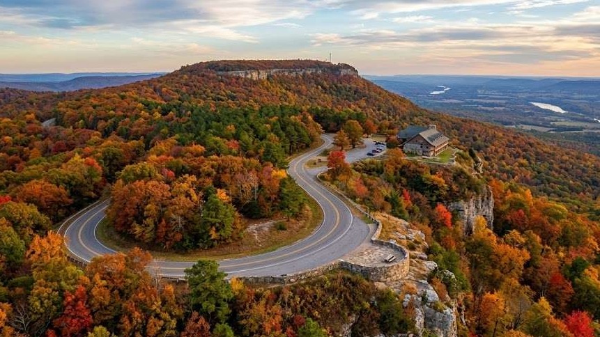 Mount Magazine outdoor adventure, scenic elevated cabin at sunset.