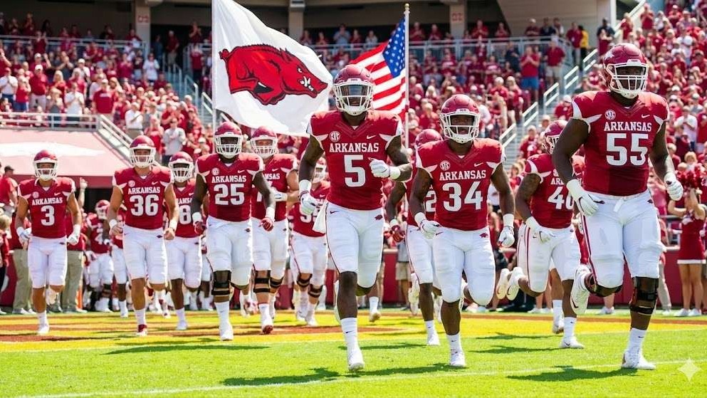 Razorback Football staff in sports broadcast studio, December 12th, 2025.