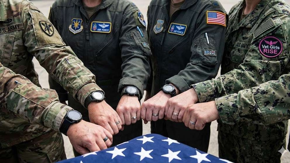 Diverse women celebrating National Vet Girls Rise Day.