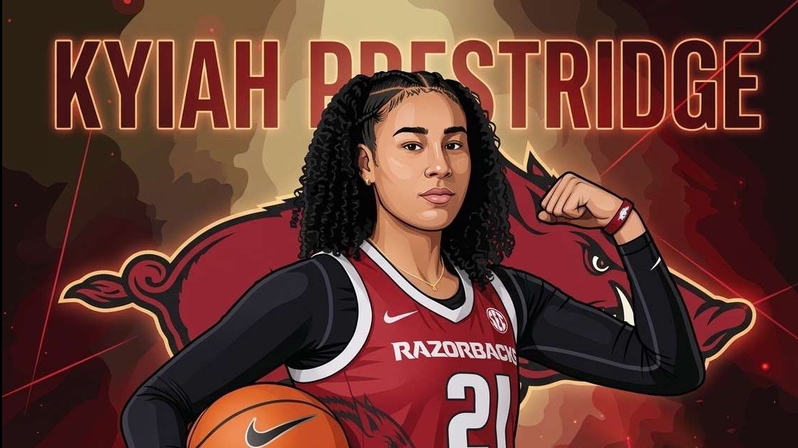 Arkansas women's basketball commitment Kyiah Prestridge with coach against Razorbacks backdrop.