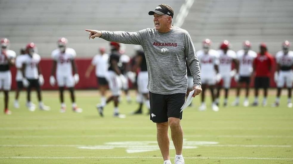 Arkansas Razorbacks vs LSU football game collage.