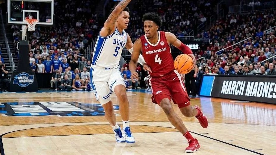 Arkansas basketball progress depicted in an intense game against Duke.
