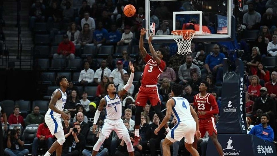 Razorbacks Basketball Performance: Postgame reaction graphic with team logos.