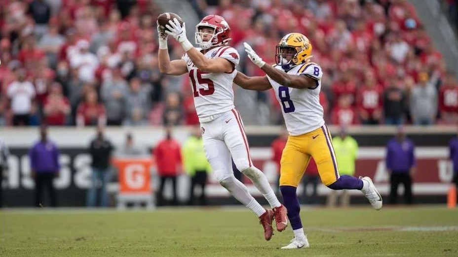 Arkansas vs LSU college football simulation, player celebrating.