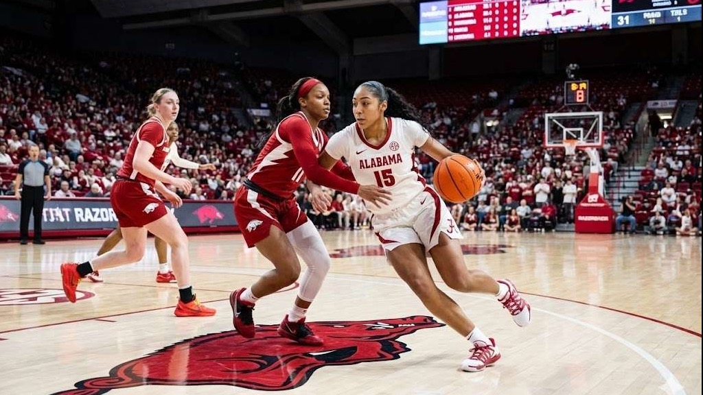 Arkansas women's basketball player takes a shot against Alabama.