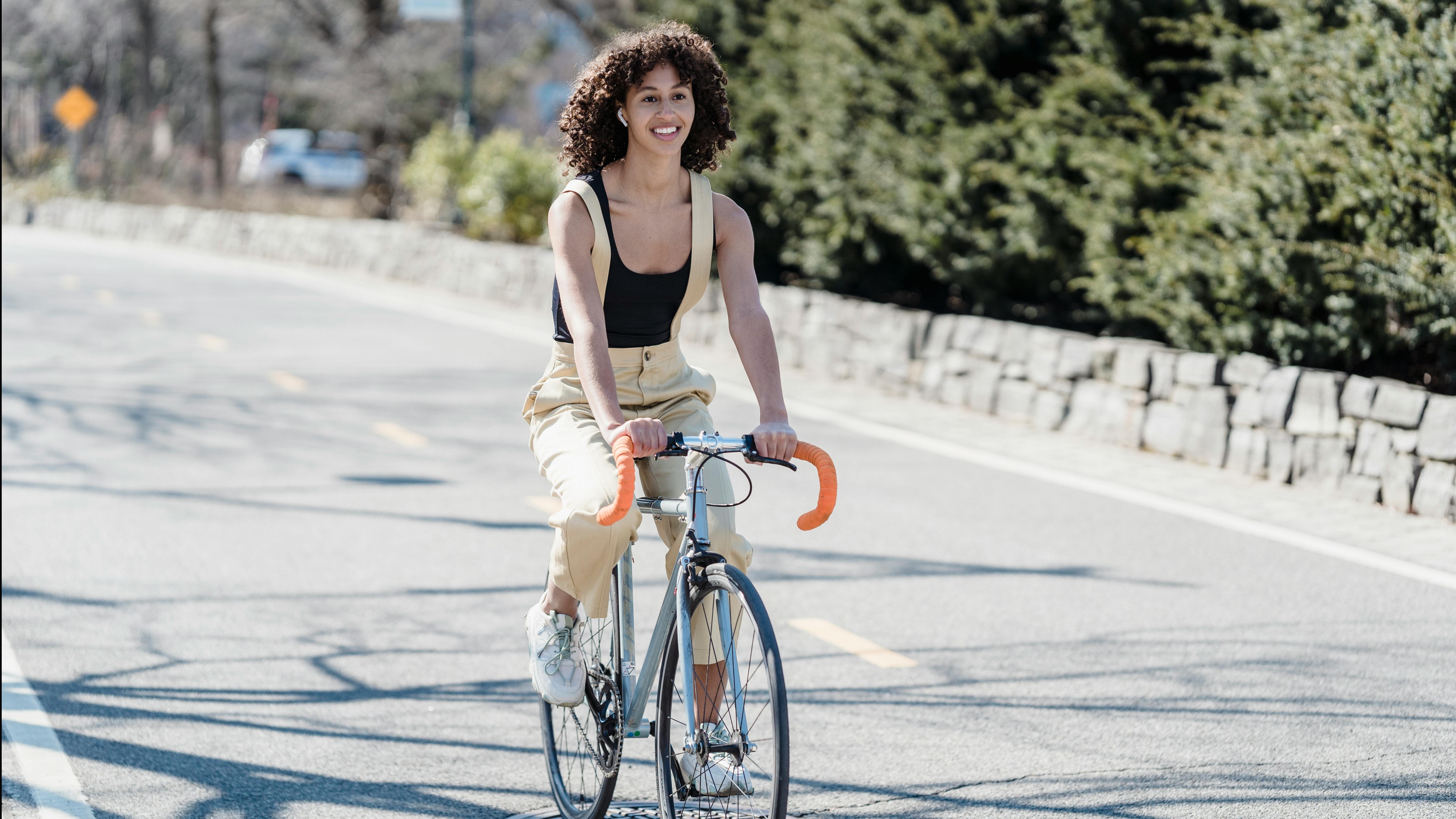 Cycling Bentonville close-up of bicycle wheel on a dirt path.