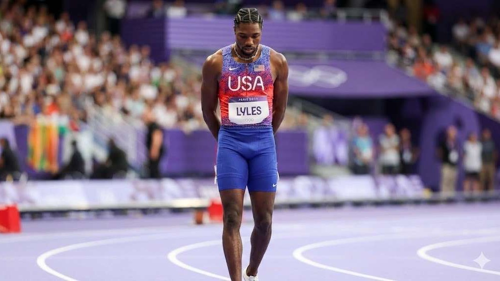 Noah Lyles at Tyson Invitational triumphantly bites gold medal.