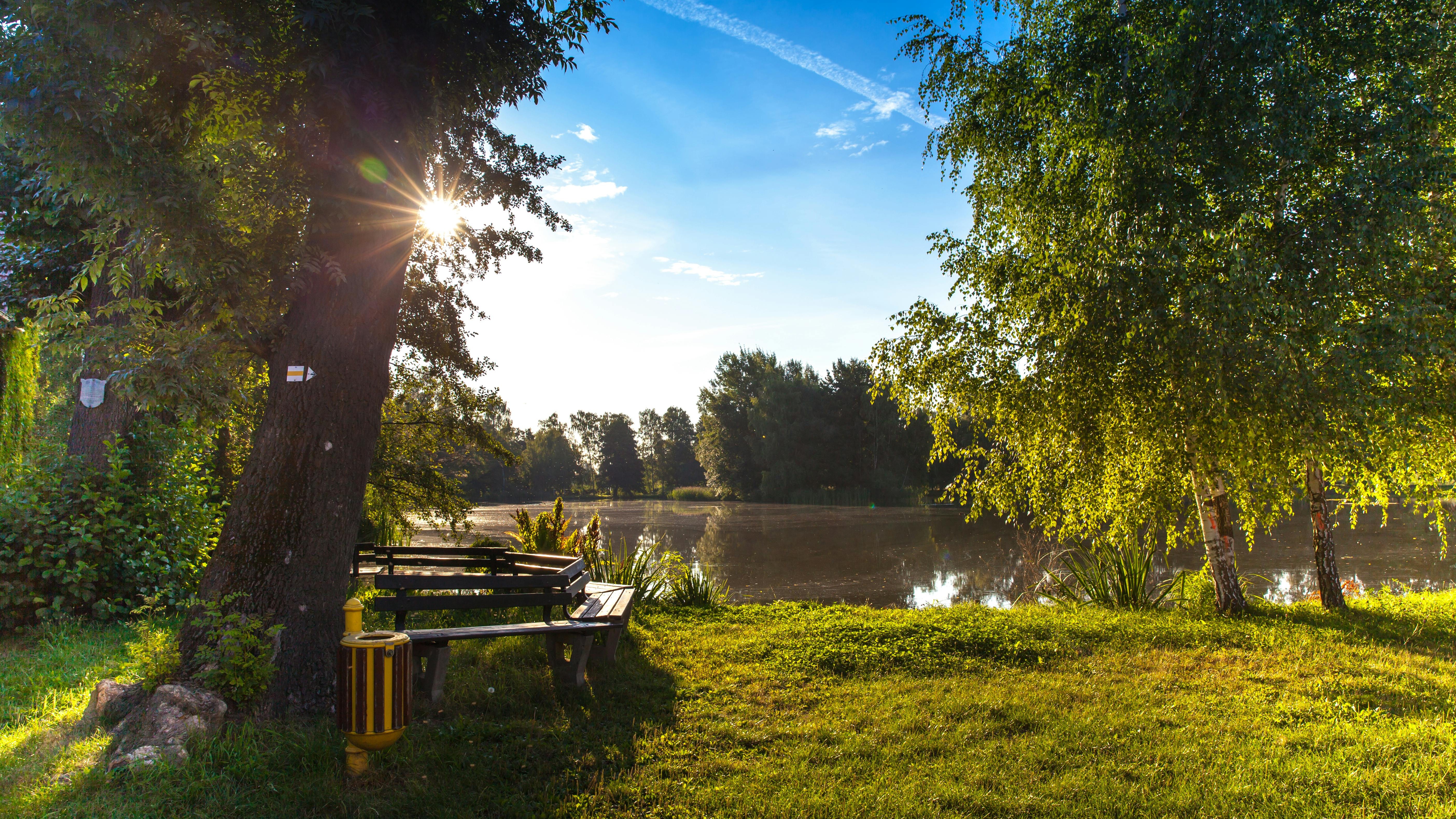 Press conference at Blanchard Springs State Park with officials and flags.