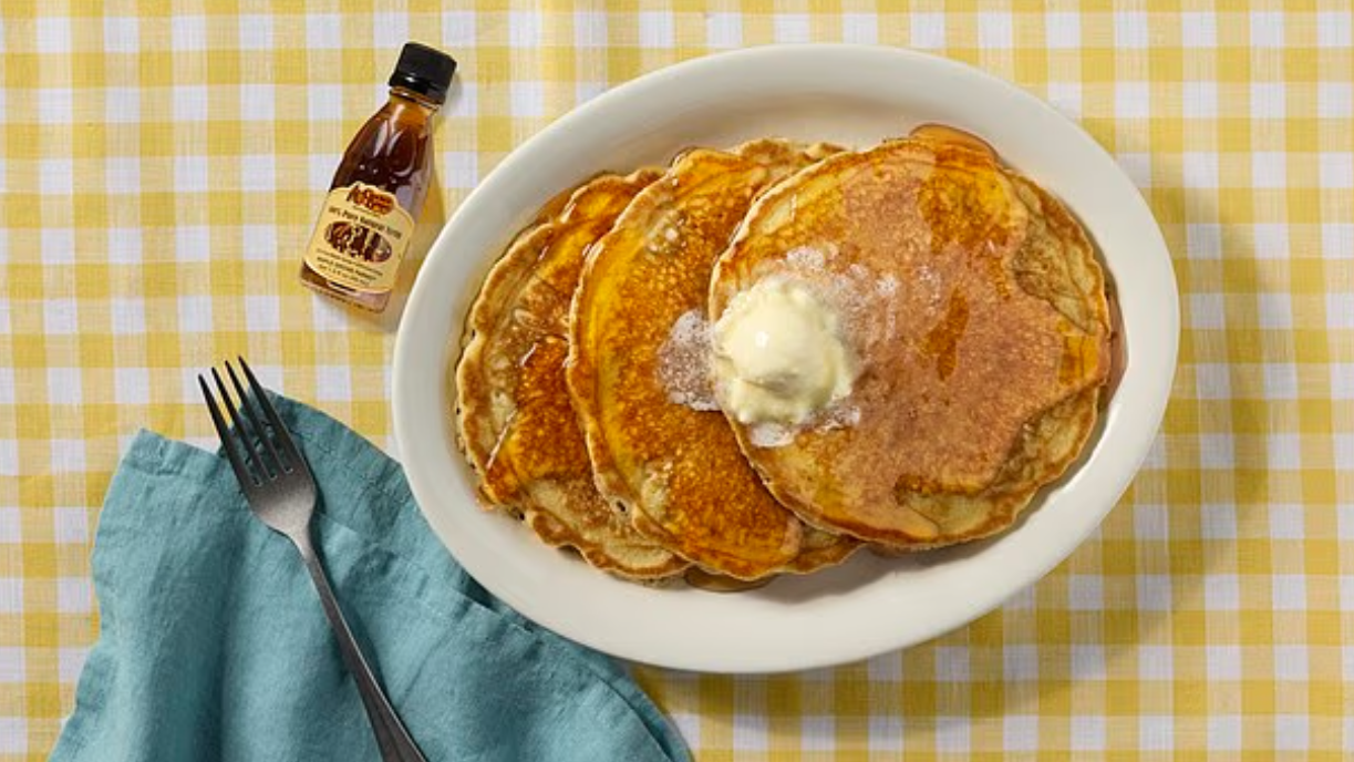 Pancake cooking in a pan for National Pancake Day.