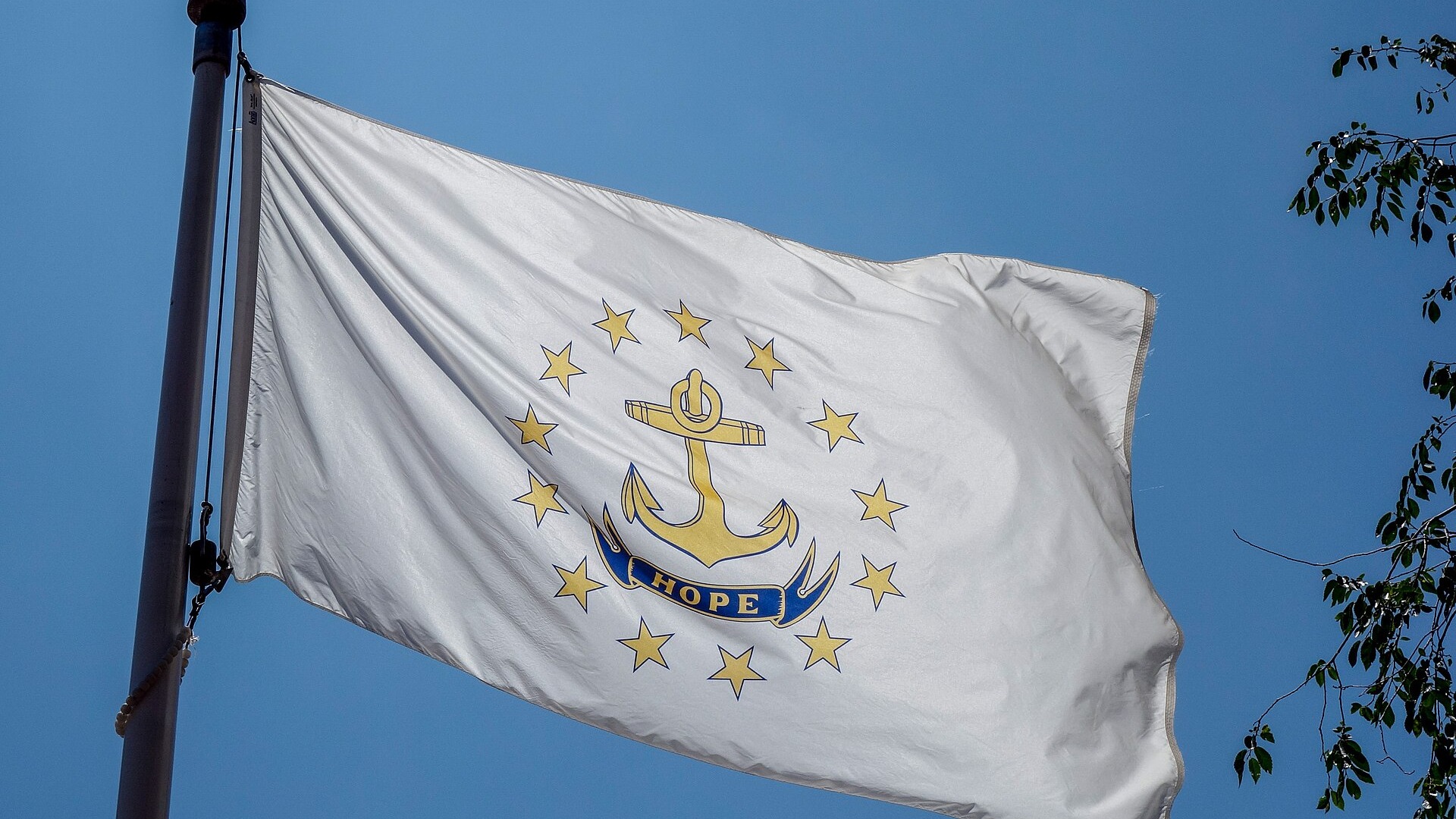 Colorful close-up map of Rhode Island with National Rhode Island Day banner.