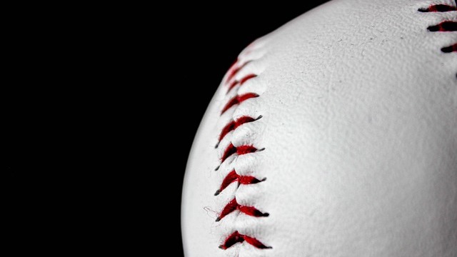 Arkansas Razorbacks SEC Tournament baseball scene with two figures.