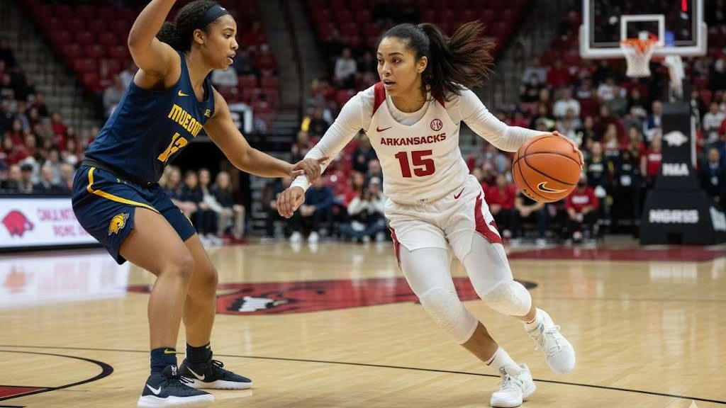 Woman at press conference speaking on Razorbacks face tough SEC competition