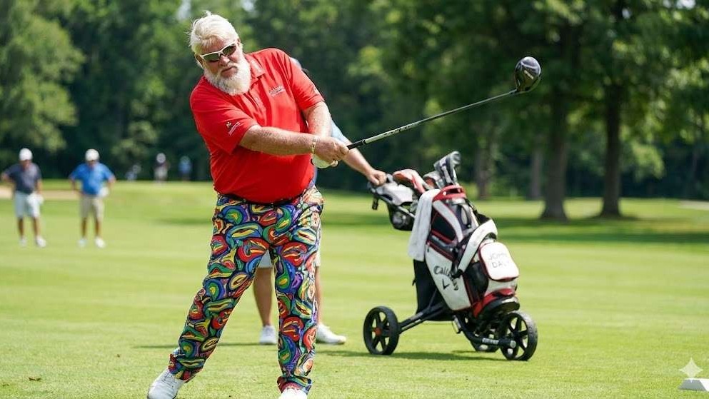 John Daly II PNC Championship performance, putting on green.