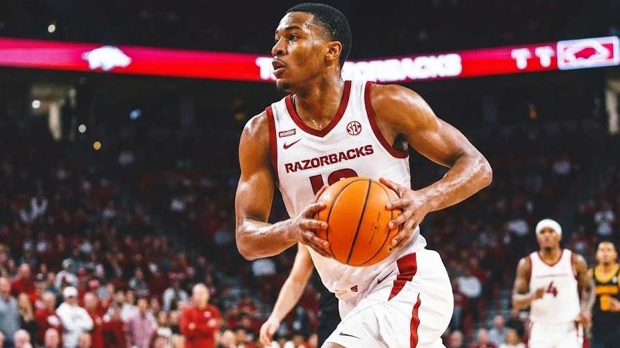 Arkansas Razorbacks athletes in action with intense focus.