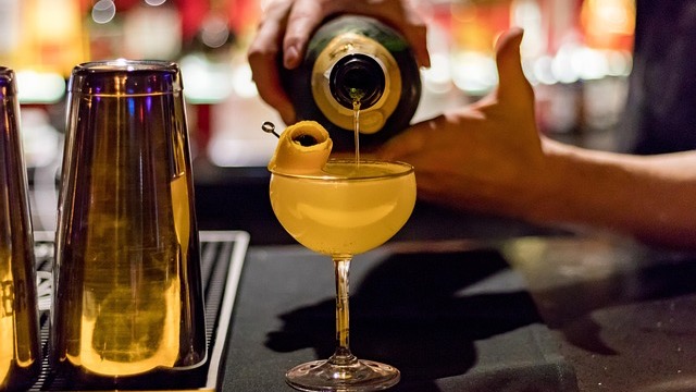 Casual conversation at Muselet Champagne Bar with microphones.