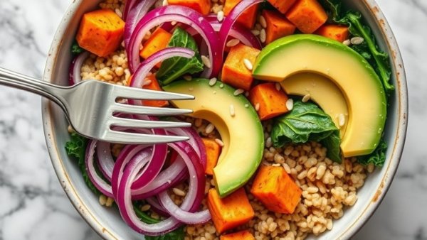 Colorful bowl of filling foods for satiety on marble surface.