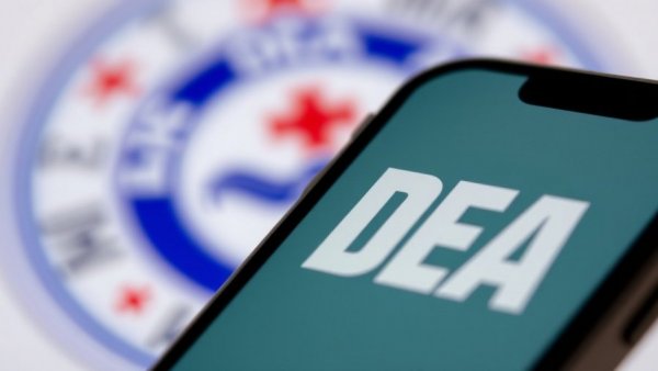 DEA logo on smartphone highlighting opioid diversion case.