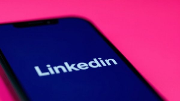 LinkedIn logo on smartphone displaying AI search visibility for MedSpas.