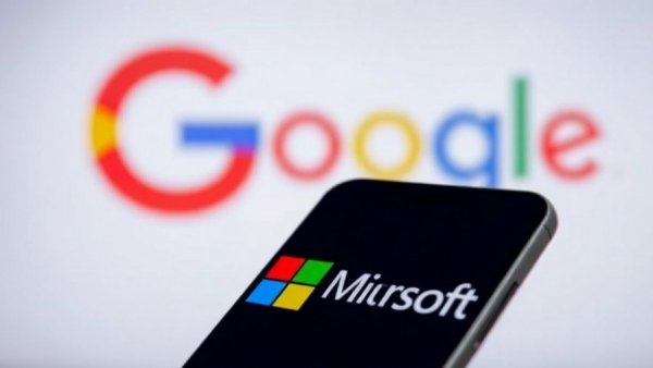Microsoft logo on smartphone with Google logo behind, illustrating search advertising revenue growth.