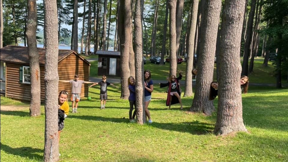 Camping kids playing in trees at Lake Lauderdale