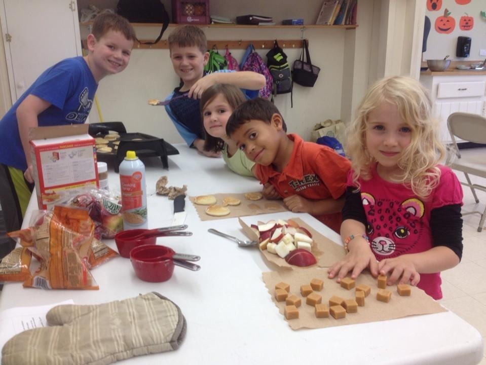Youth Commission kids making apple fritters