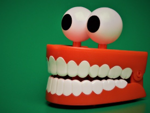 email subject lines must have a certain 'bite' to get email opened . (Picture of chattering teeth with eyes attached)