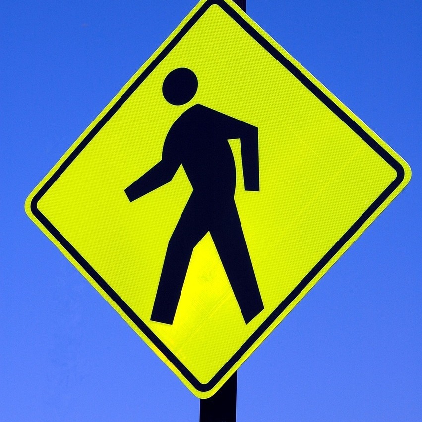 Photo of bright pedestrian crossing sign