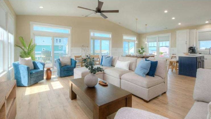 elegant oceanfront pool, tranquil oasis, water shimmering gracefully, photorealistic, overlooking the endless horizon, highly detailed, crystal-clear reflections, shutter speed 1/250s, azure blues, bright midday sun, shot with a 70-200mm telephoto lens.