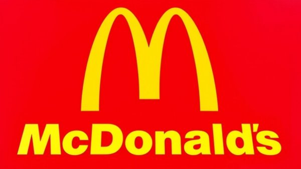 Bold McDonald's golden arches logo on vivid red background.