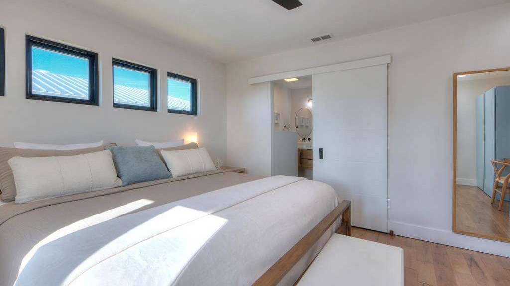 Efficient property lease negotiation in a spacious, photorealistic office with urban views.