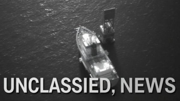 US forces intercept oil tanker in aerial thermal image.