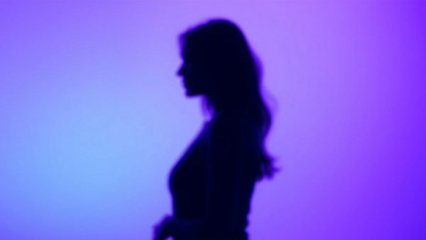 Blurry silhouette of a woman conveying introspective perimenopause symptoms.