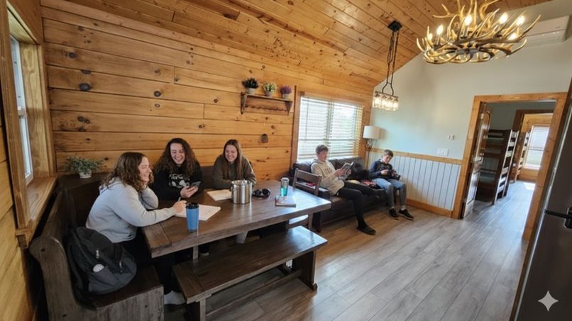 Modern air-conditioned camp cabins for youth at Camp Impact, clean bright interiors, relaxed campers, youth church camp central florida.