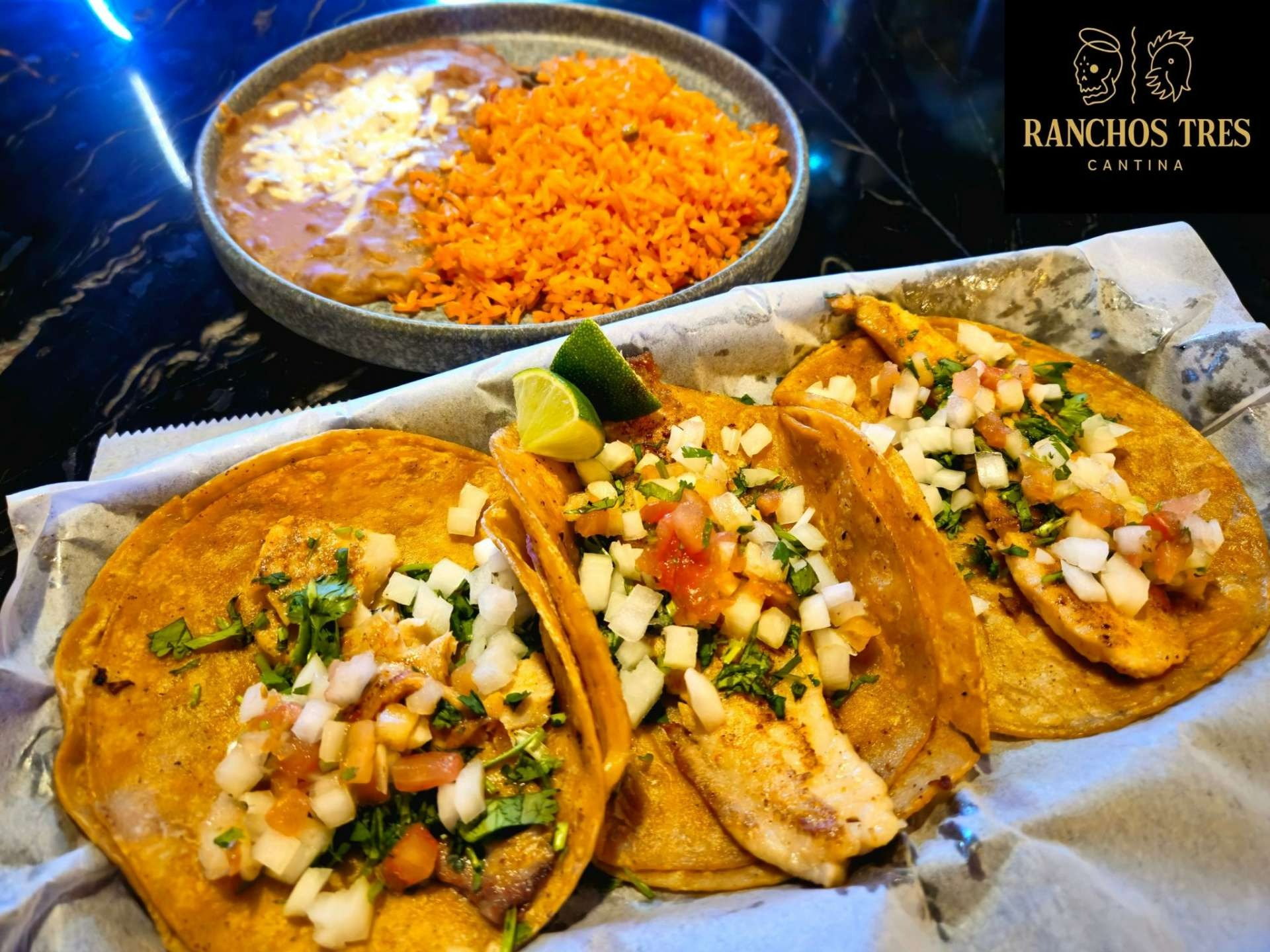 3 fish or shrimp tacos with rice and beans at ranchos tres cantina north tonawanda new york
