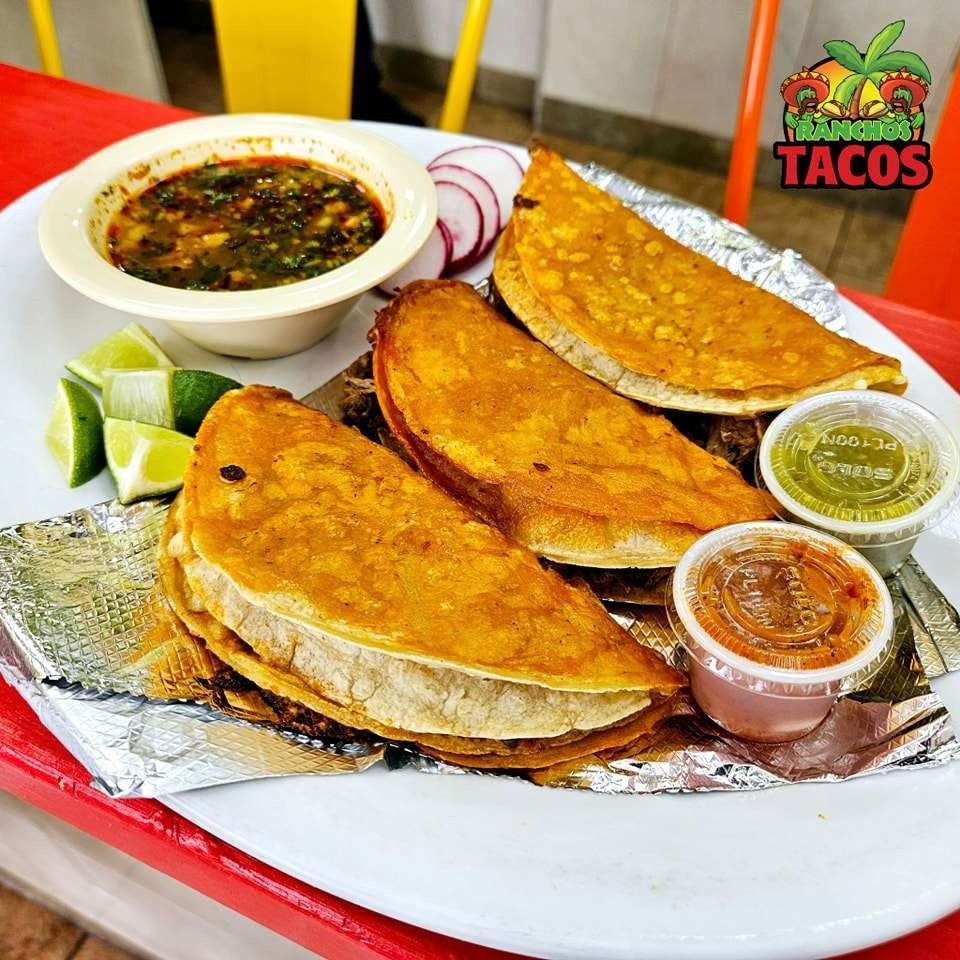 birria tacos  with consome at ranchos tacos in amherst new york