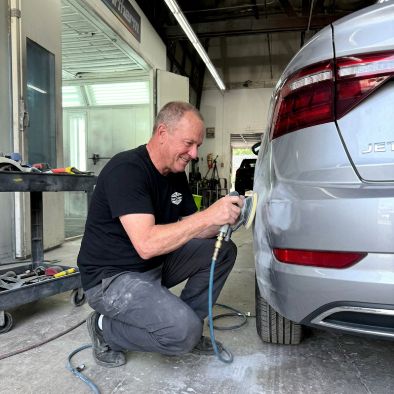 tech doing minor collision repair in Downers Grove IL at Bob Carter's Auto Body