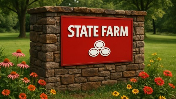 State Farm Insurance sign in lush greenery, undervalued ACV claims against State Farm.