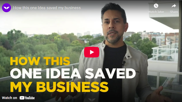 Man discussing how webinars transformed his business on a balcony with city view.