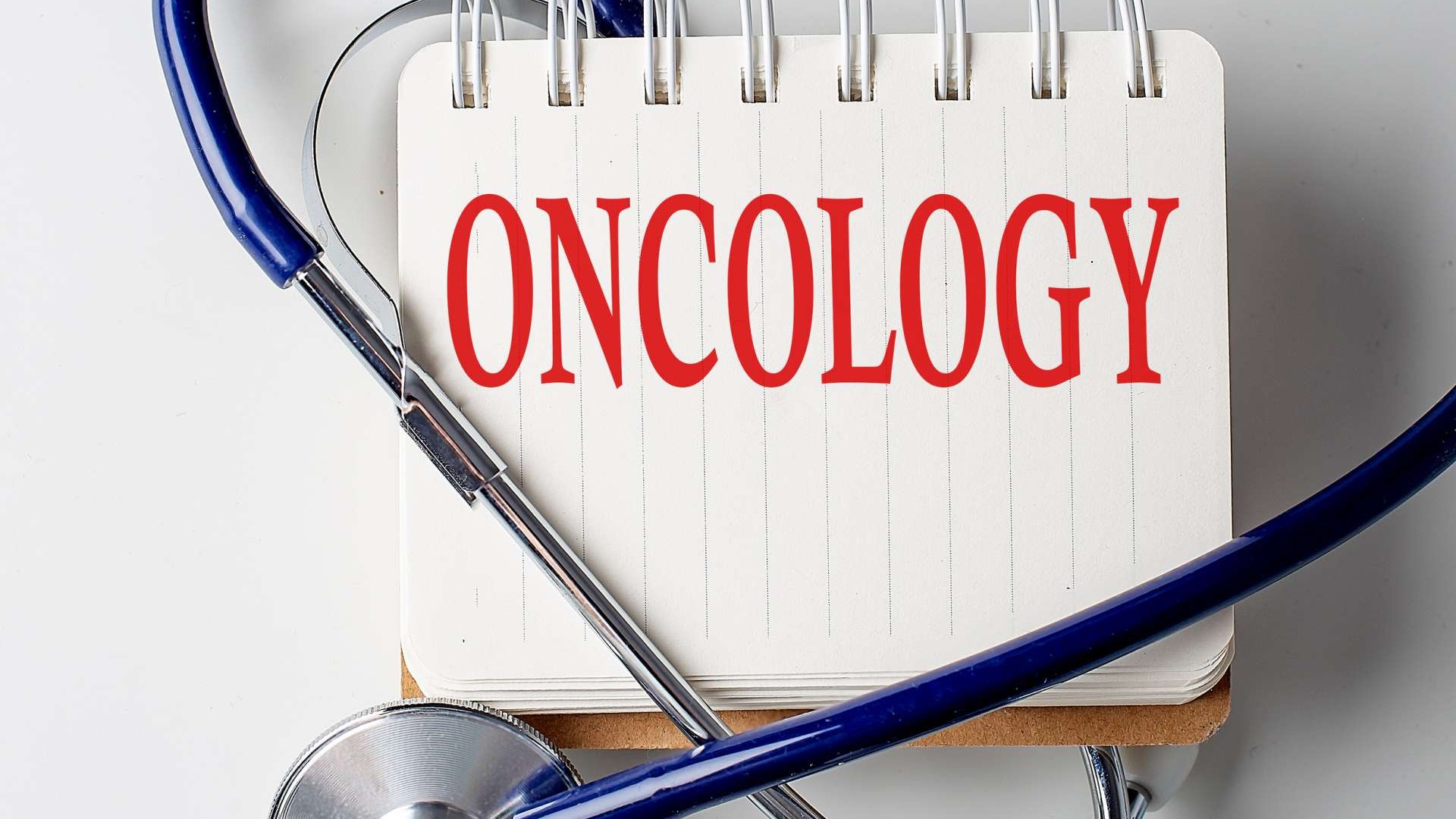 Oncology title with stethescope symbolizing fast track cancer drug access.