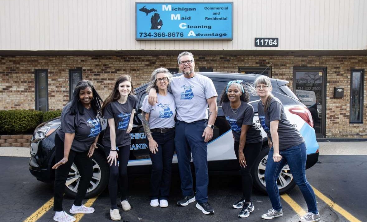 MI Maid Cleaning Advantage owners and team outside their office