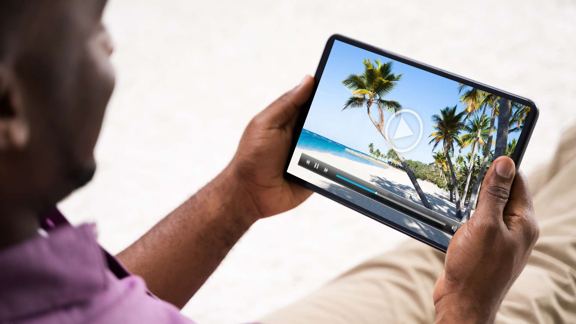 person watching a video on a tablet
