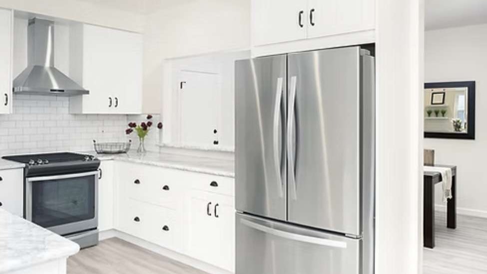 Photorealistic shiny clean modern kitchen with stunning metal sheen.