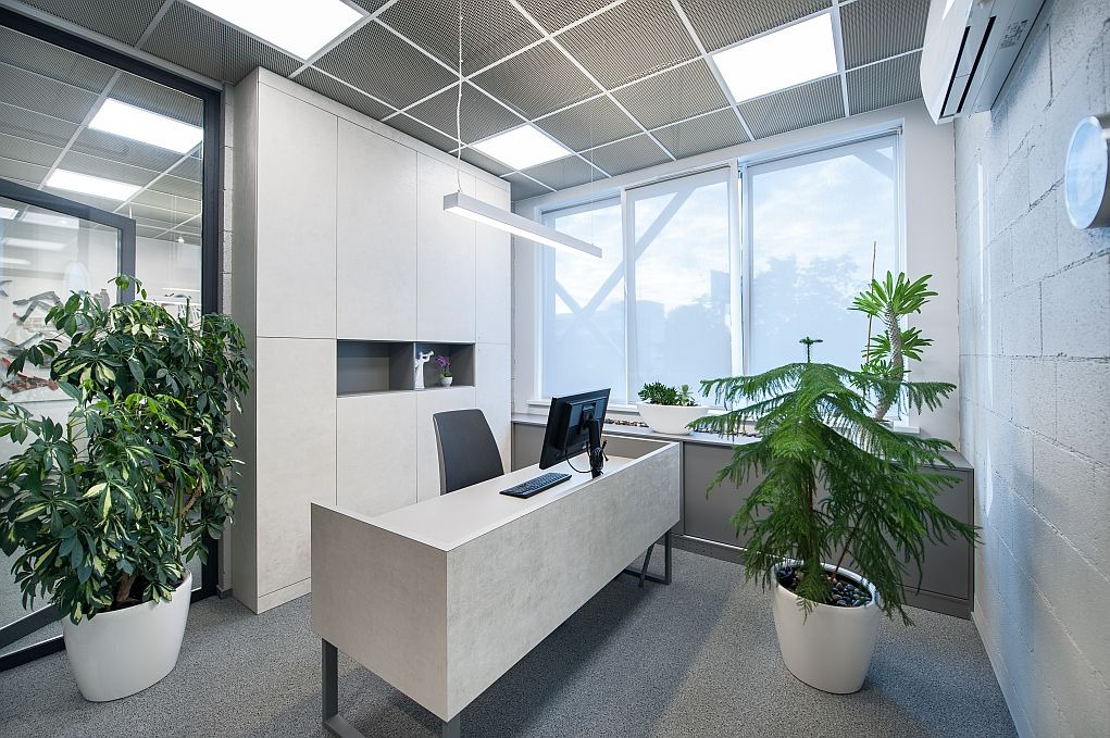 Modern office interior with LED lighting.