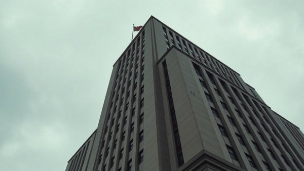 Government building with flag, related to EB-3 visa program construction.