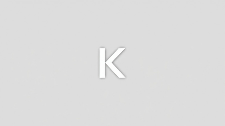 Minimalistic letter K on gray background.